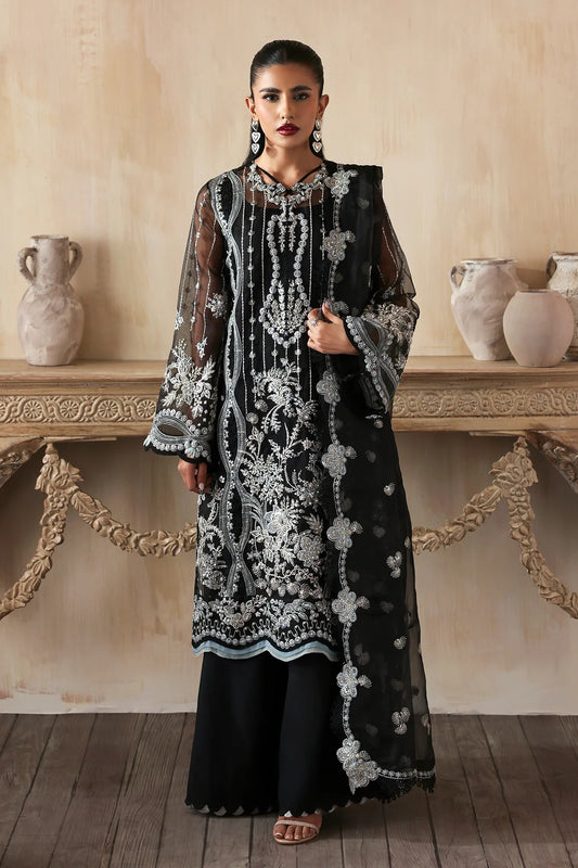 Elegant hand-embroidered organza suit with detailed front, back, and sleeves panels, paired with a matching organza dupatta and dyed trousers—perfect for festive occasions.