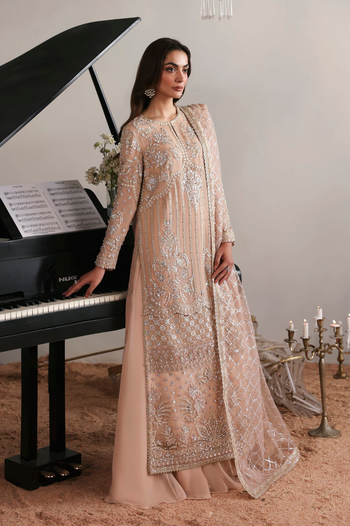 Akbar Aslam Elodie side view of chiffon shirt and sharara
