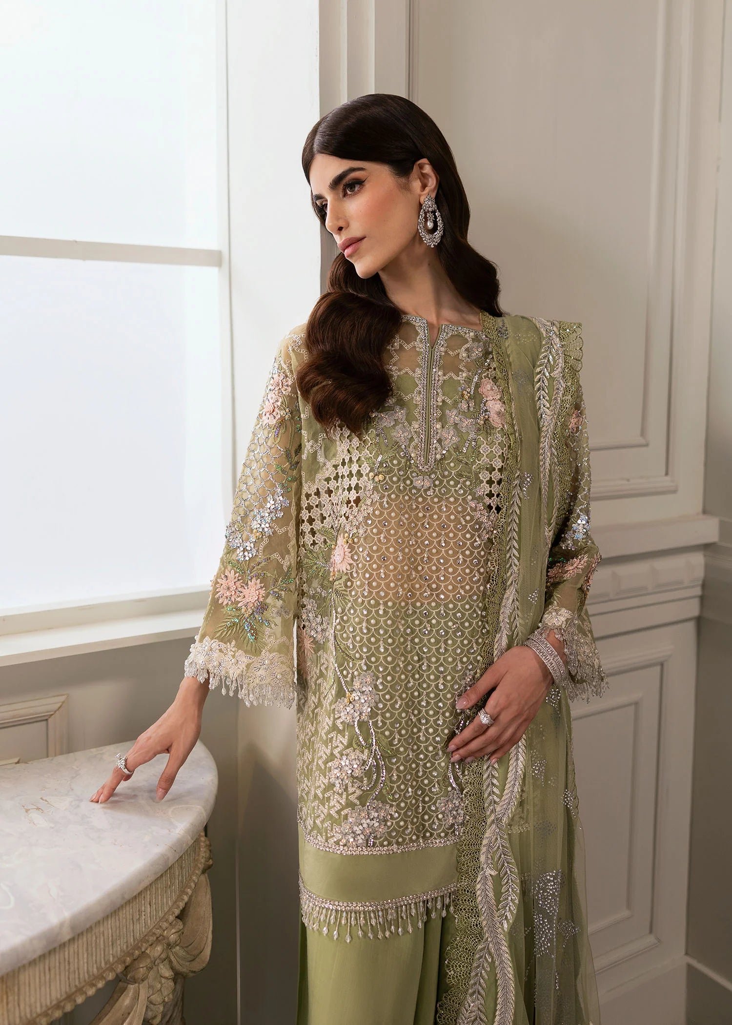 Shop CRIMSON X SAIRA SHAKIRA Wedding Formals '24 Sparkle Cascade at Raz Ruya! Huge discounts on luxury Pakistani wear with fast delivery to the UK, USA & Canada