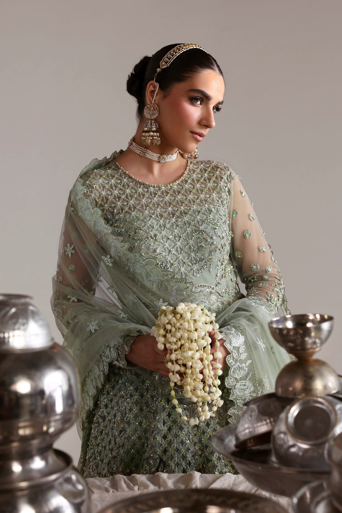 Akbar Aslam Mahsima back view of net blouse and lehenga