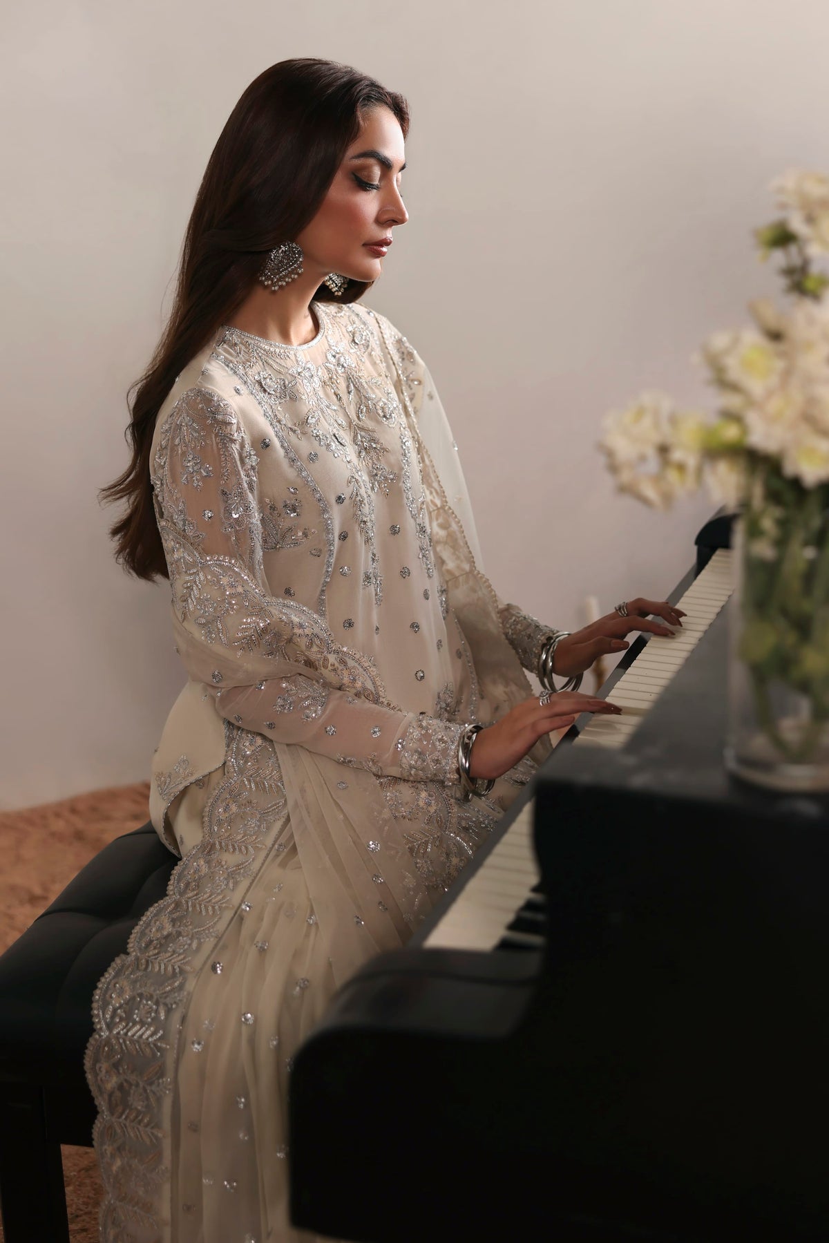 Akbar Aslam Estelle side view of embellished chiffon panels