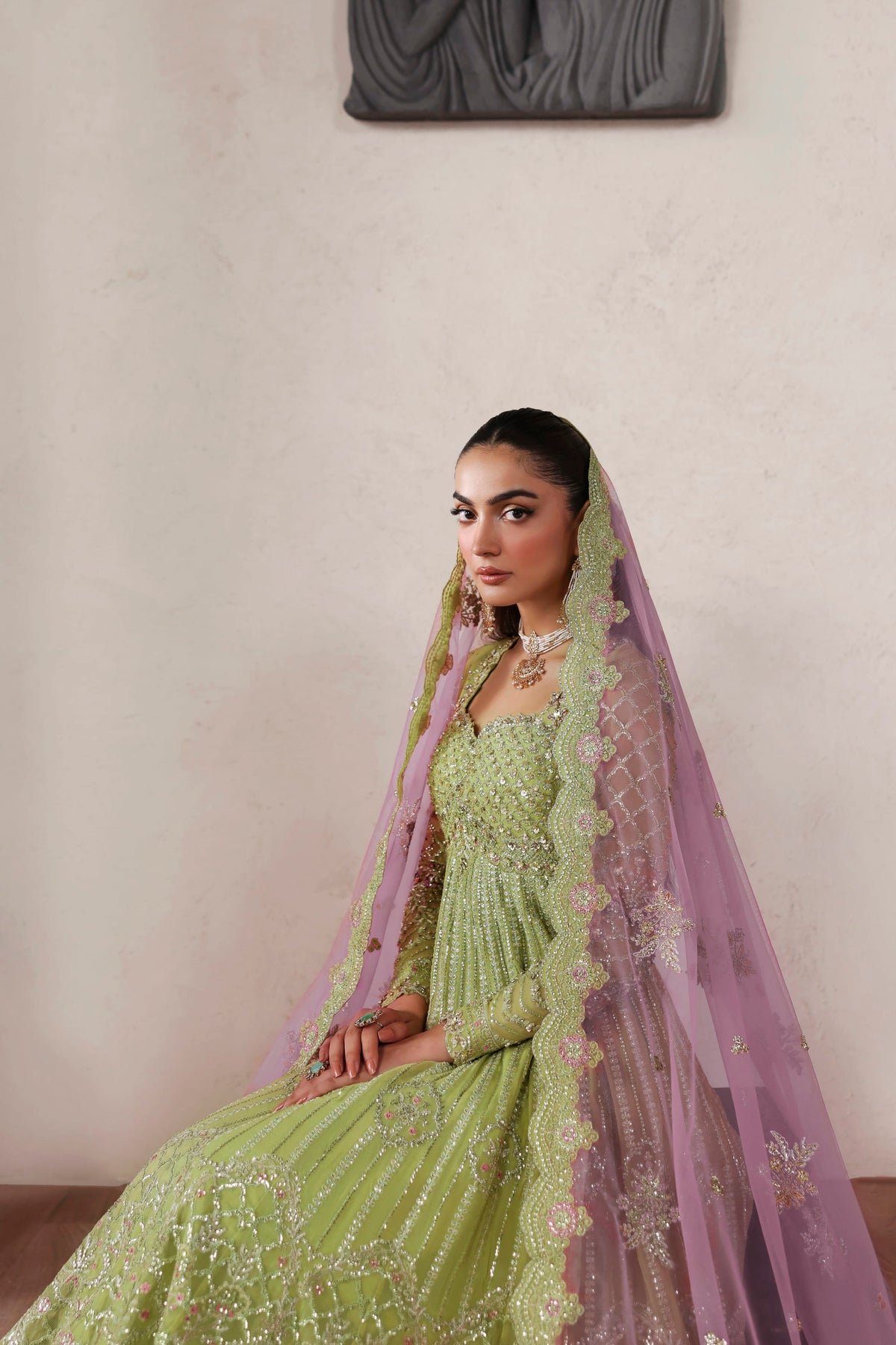 Akbar Aslam Zarelle back view of chiffon blouse and maxi