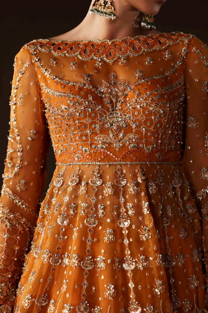 Shop organza embroidered lehenga with hand embellished blouse, panels & dupatta. Includes raw silk lining—perfect for weddings & festive wear.