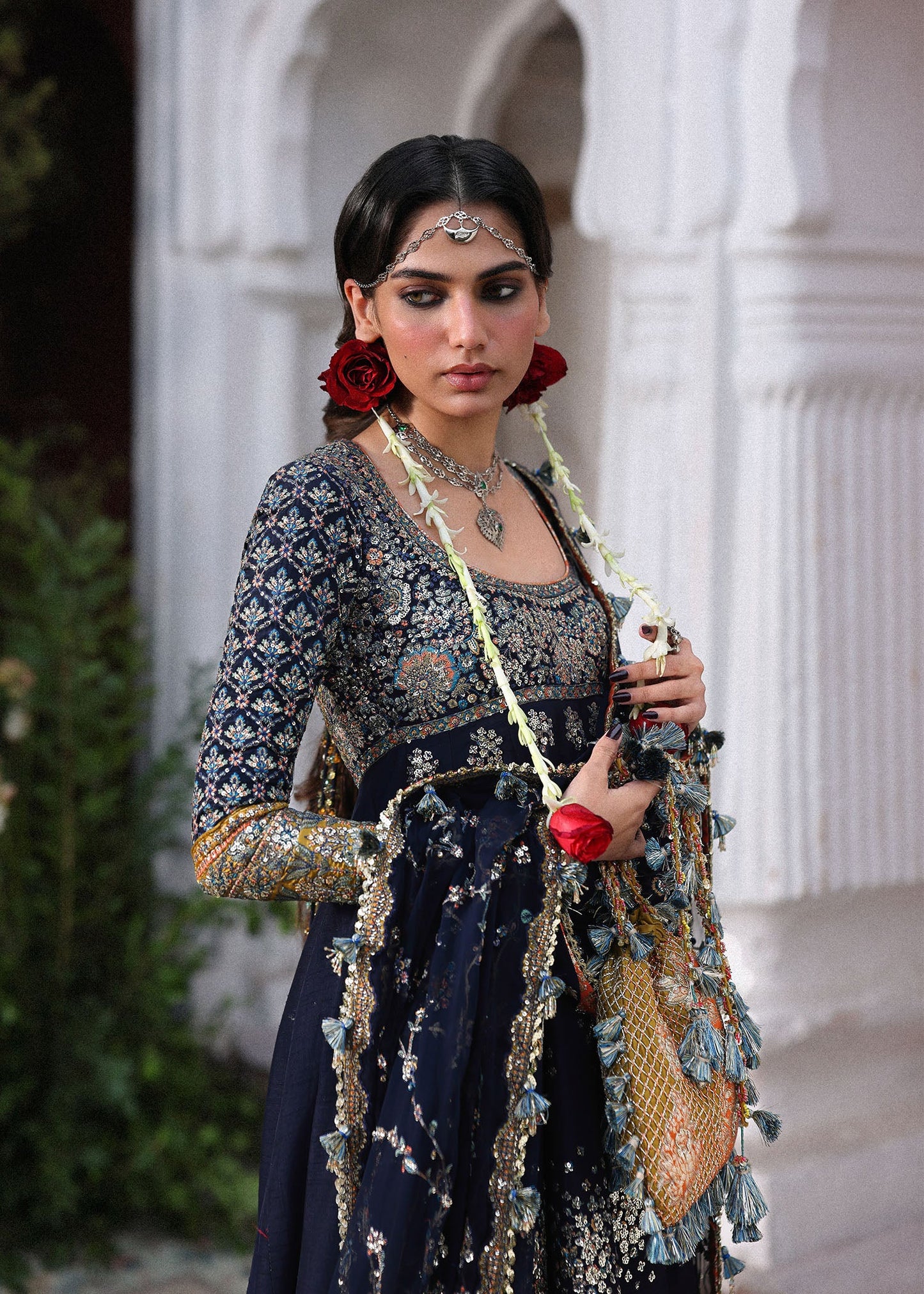 Elegant navy blue Korean raw silk pishwas with embroidered panels and sleeves, paired with printed chooridar and chiffon dupatta with four-sided borders.