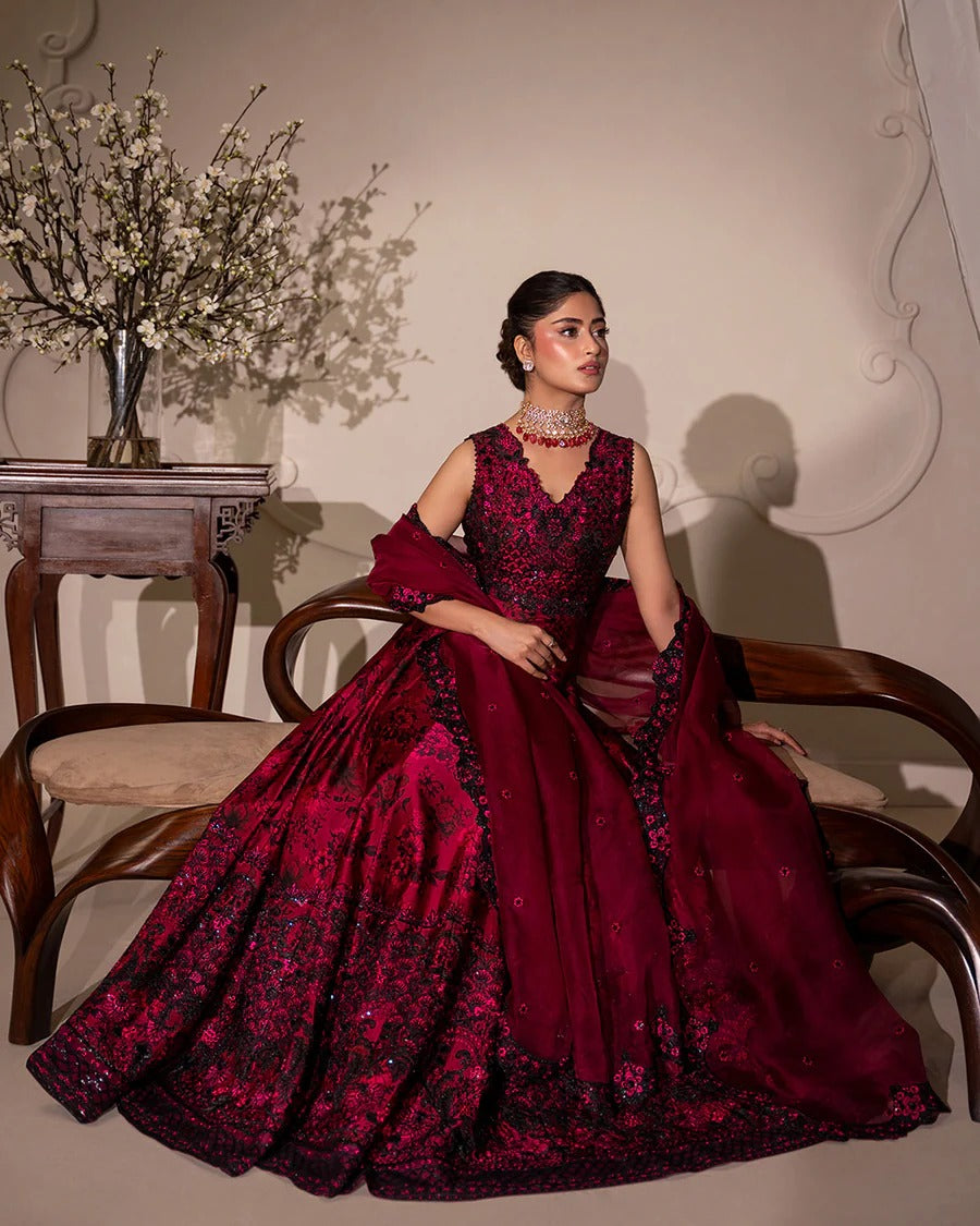 Havin set in dark magenta shamose silk with printed and embroidered shirt, paired with embroidered organza/net dupatta and silk trousers—perfect for festive occasions.