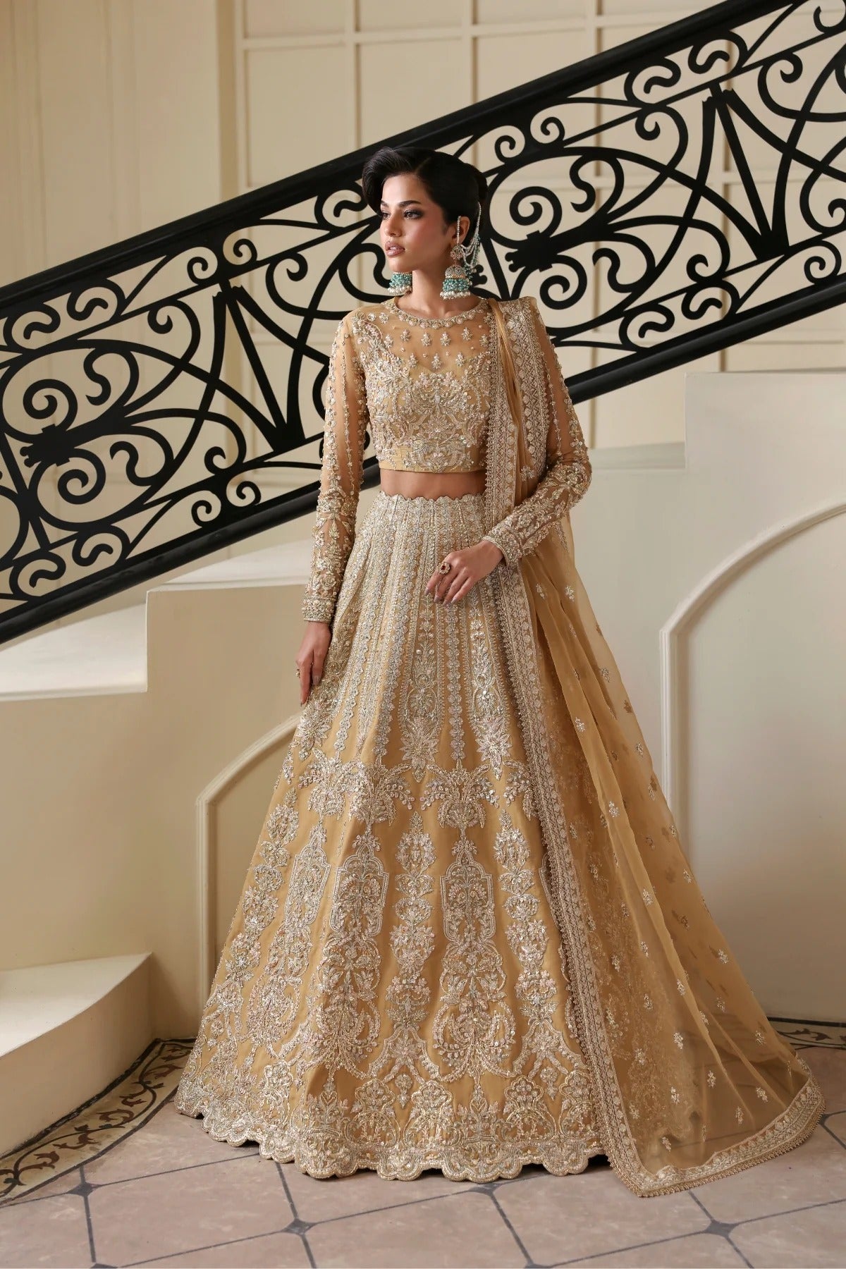 Graceful organza dress featuring hand-embellished body, sleeves, embroidered panels, and dupatta. Paired with 6 yards dyed Russian grip inner for full coverage.