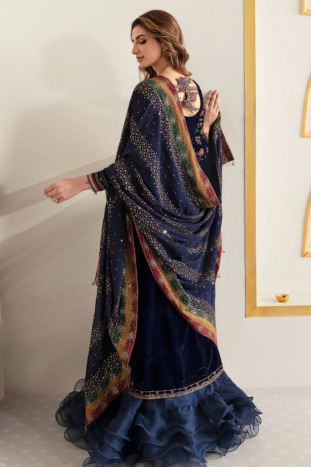 Rich velvet formal dress with intricate embroidery, chiffon dupatta, and silk trouser. A timeless outfit blending elegance, comfort, and sophistication.