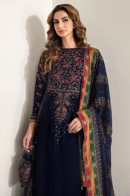 Rich velvet formal dress with intricate embroidery, chiffon dupatta, and silk trouser. A timeless outfit blending elegance, comfort, and sophistication.