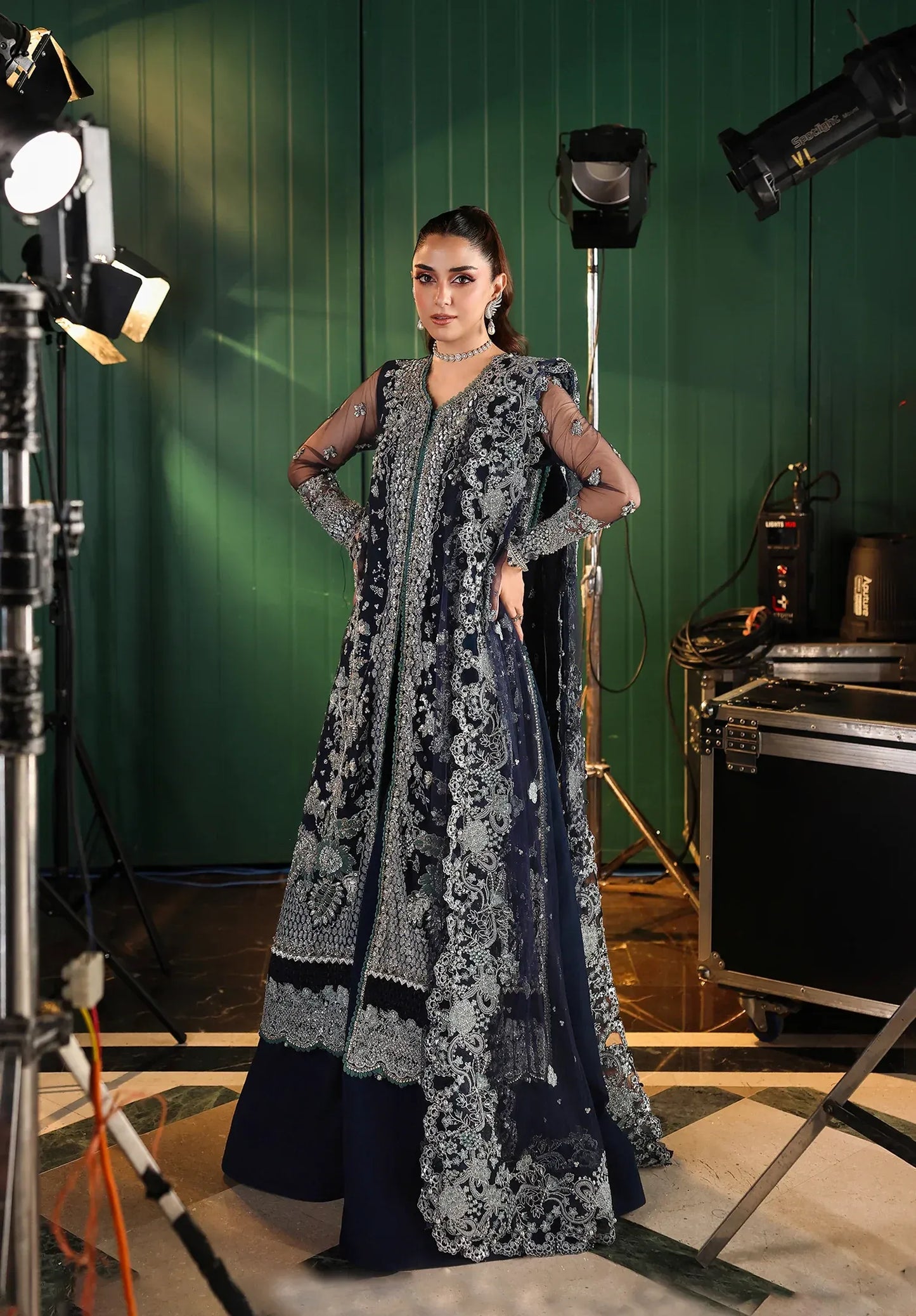 Skyfall by Elaf Stardom ’25 features hand-embroidered poly-net panels, detailed dupatta, and raw silk inner — perfect for formal evenings and festive elegance.