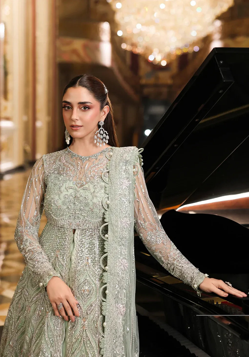 Elaf Stardom Diana – Hand Embellished 3Pc Poly Net SetDiana by Elaf Stardom ’25 features hand-embroidered poly-net panels, elegant dupatta, and raw silk inner — perfect for festive occasions and timeless sophistication.