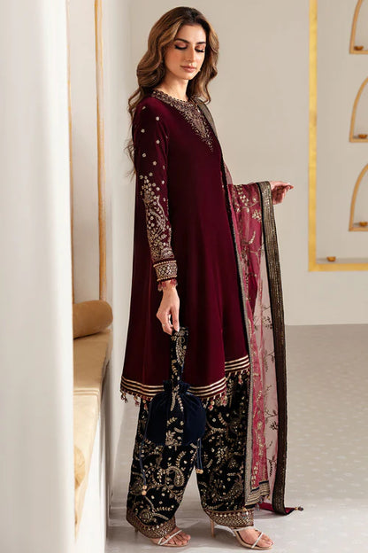 Elegant pure velvet dress with embroidered front, sleeves, and trouser. Paired with organza dupatta for a luxurious and graceful formal look.