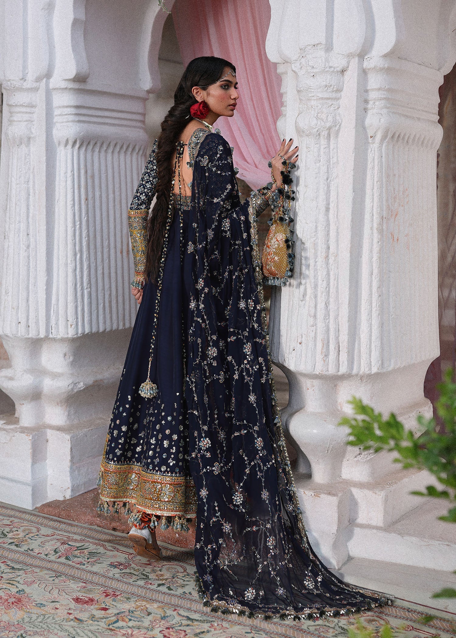 Elegant navy blue Korean raw silk pishwas with embroidered panels and sleeves, paired with printed chooridar and chiffon dupatta with four-sided borders.