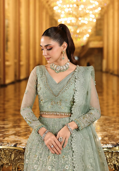 Lime Light by Elaf Stardom ’25 features hand-embroidered organza panels, elegant dupatta, and raw silk inner — perfect for festive gatherings and formal occasions.