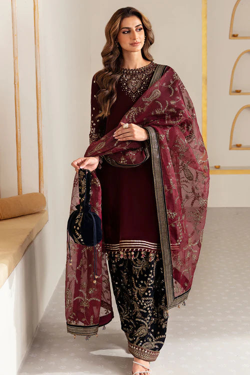 Elegant pure velvet dress with embroidered front, sleeves, and trouser. Paired with organza dupatta for a luxurious and graceful formal look.
