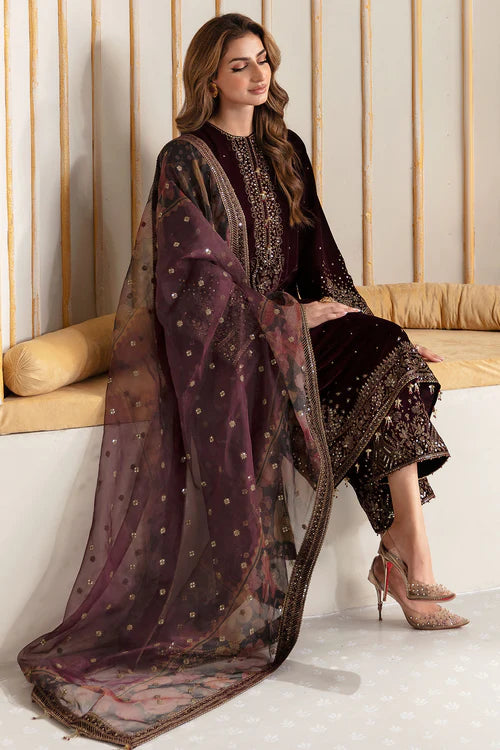 Luxurious velvet dress with intricate embroidery and digital printed organza dupatta. A perfect choice for graceful and sophisticated formal occasions.