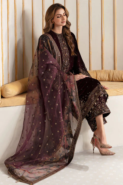 Luxurious velvet dress with intricate embroidery and digital printed organza dupatta. A perfect choice for graceful and sophisticated formal occasions.