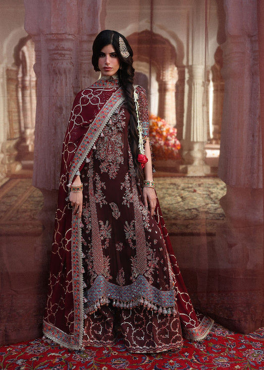 Elegant dark brown chiffon suit featuring embroidery, chatapatti trims, Korean raw silk trousers and a foil printed chiffon dupatta for a timeless look.