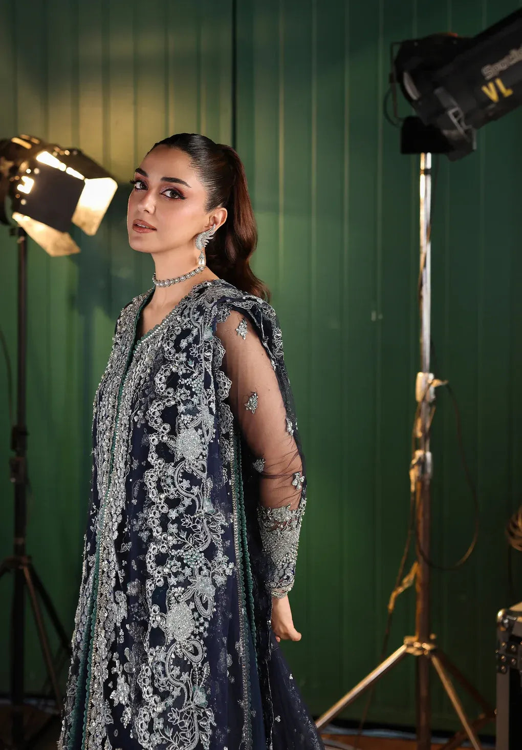 Skyfall by Elaf Stardom ’25 features hand-embroidered poly-net panels, detailed dupatta, and raw silk inner — perfect for formal evenings and festive elegance.
