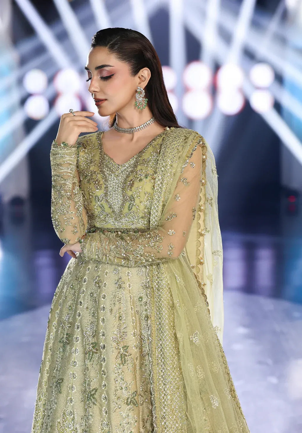 Mint Majesty by Elaf Stardom ’25 features hand-embroidered organza-poly net panels, elegant dupatta, and raw silk inner — perfect for festive and formal events.