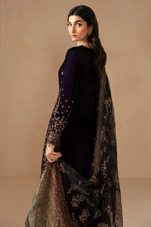 Pure velvet dress with intricate embroidery, digital printed organza dupatta, and raw silk bottom. A perfect choice for a refined and luxurious formal look.
