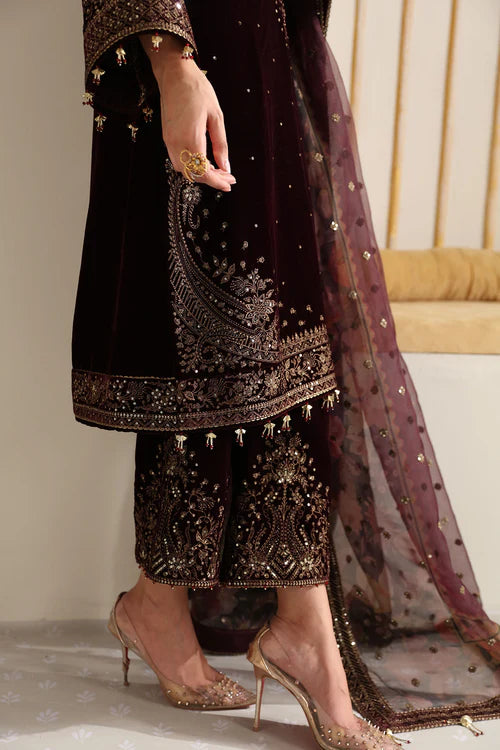 Luxurious velvet dress with intricate embroidery and digital printed organza dupatta. A perfect choice for graceful and sophisticated formal occasions.
