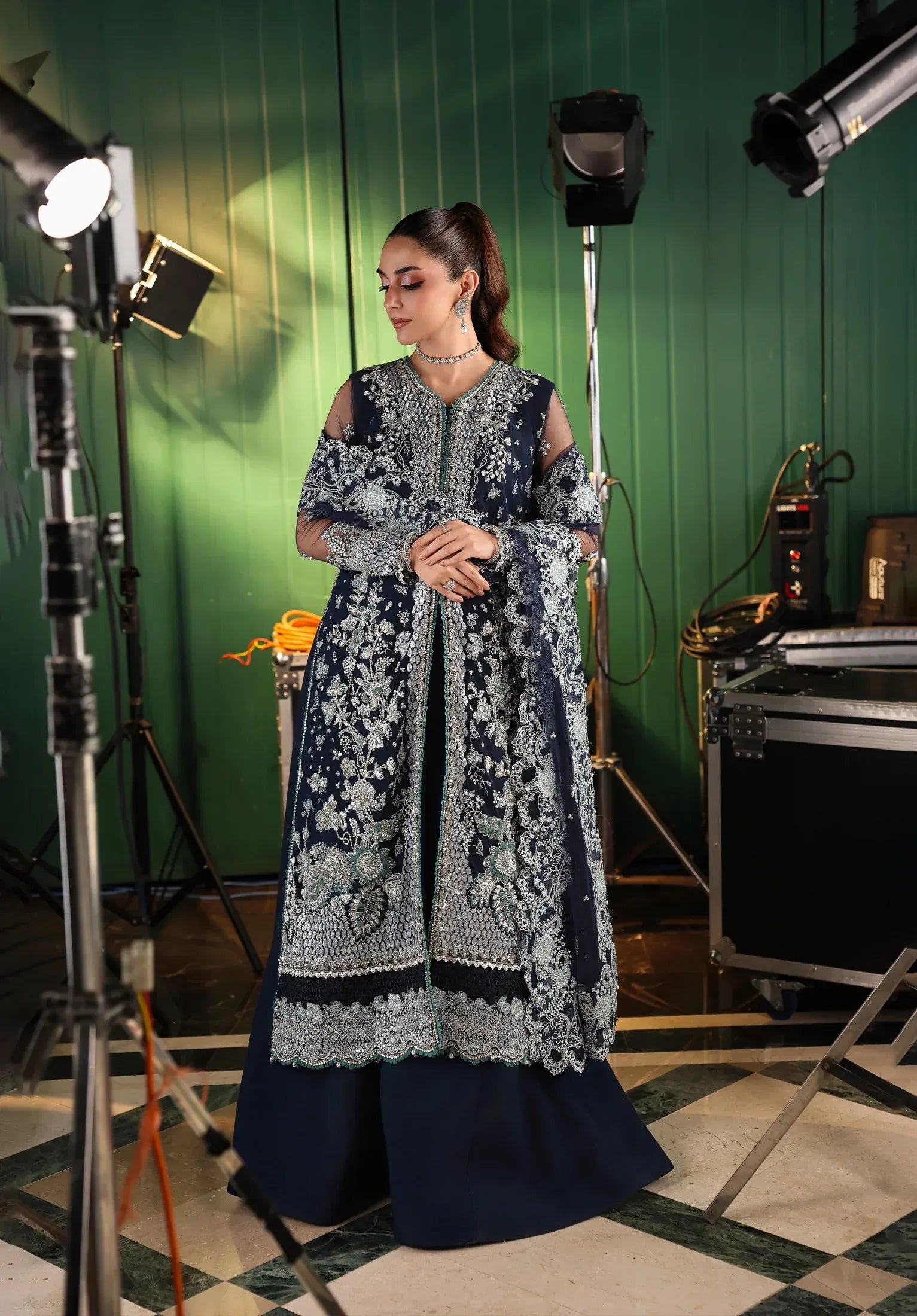 Skyfall by Elaf Stardom ’25 features hand-embroidered poly-net panels, detailed dupatta, and raw silk inner — perfect for formal evenings and festive elegance.