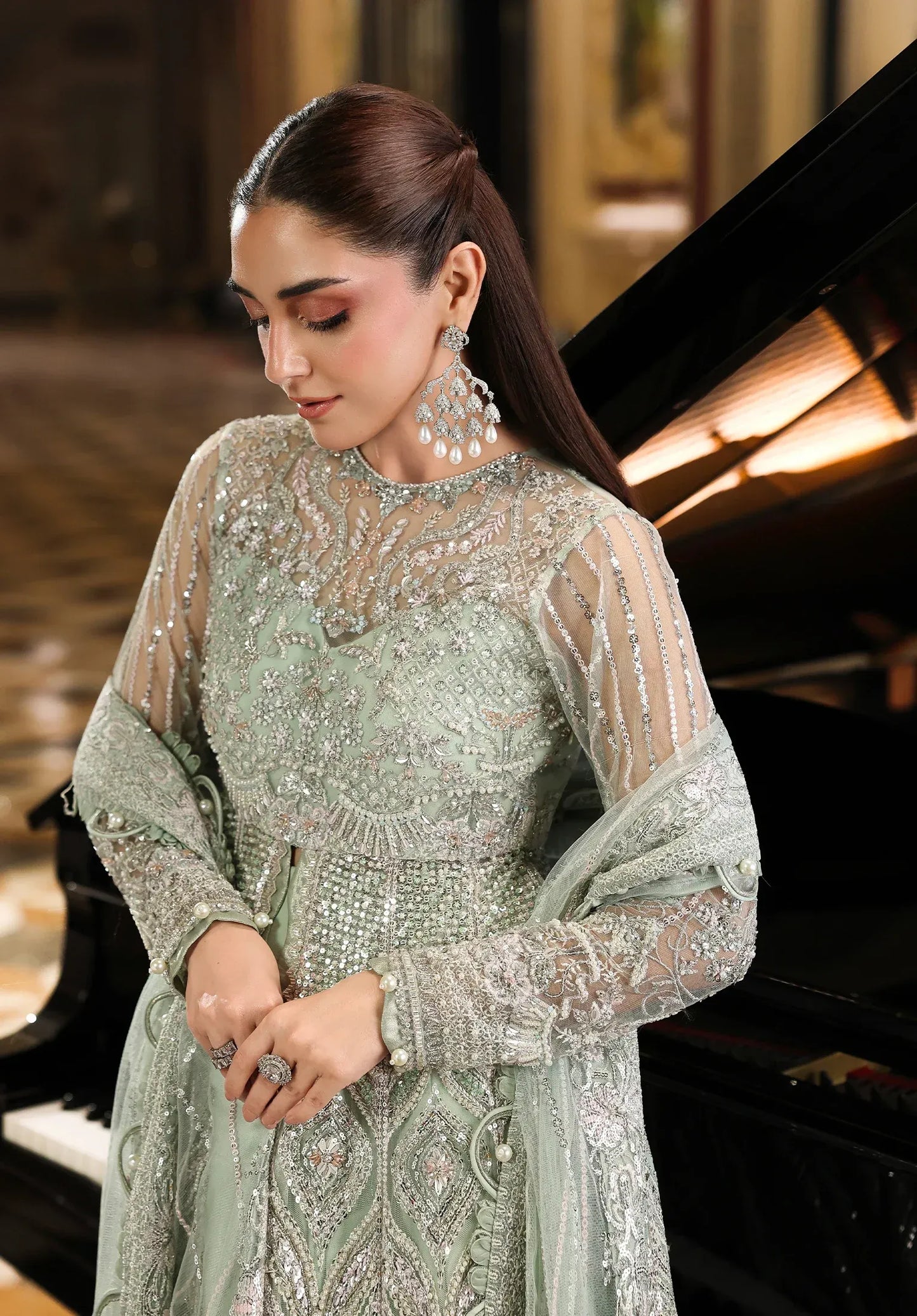 Elaf Stardom Diana – Hand Embellished 3Pc Poly Net SetDiana by Elaf Stardom ’25 features hand-embroidered poly-net panels, elegant dupatta, and raw silk inner — perfect for festive occasions and timeless sophistication.