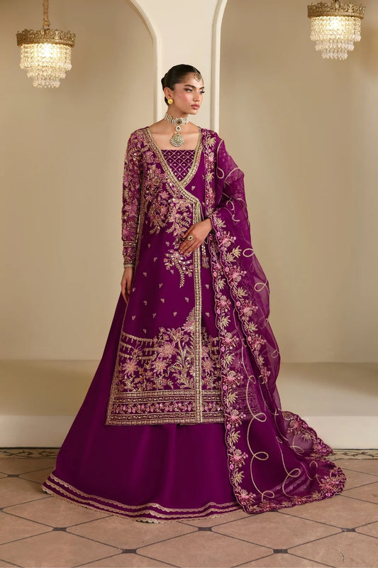 Elegant organza outfit featuring hand-embellished panels, sleeves, silk neckline, and dupatta. Includes detailed borders, Russian grip inner, and silk trouser.