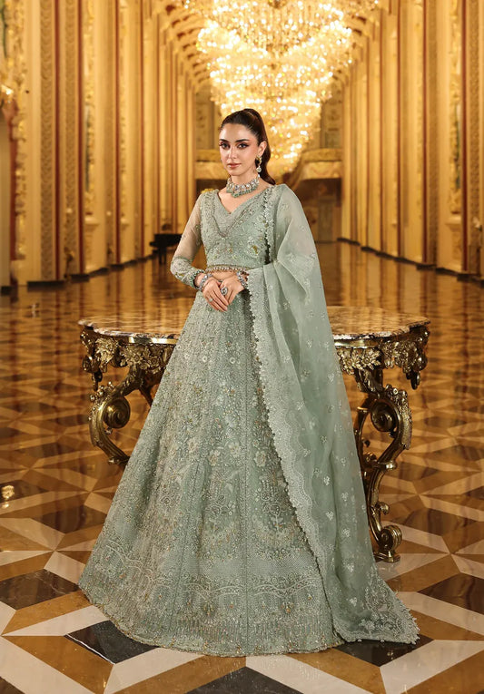 Lime Light by Elaf Stardom ’25 features hand-embroidered organza panels, elegant dupatta, and raw silk inner — perfect for festive gatherings and formal occasions.