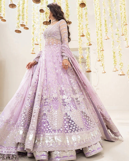 Pinar ensemble in lilac net bodice jacket with embroidered Shamose silk lehnga and flowy chiffon dupatta—perfect for weddings, festive occasions, and formal events.