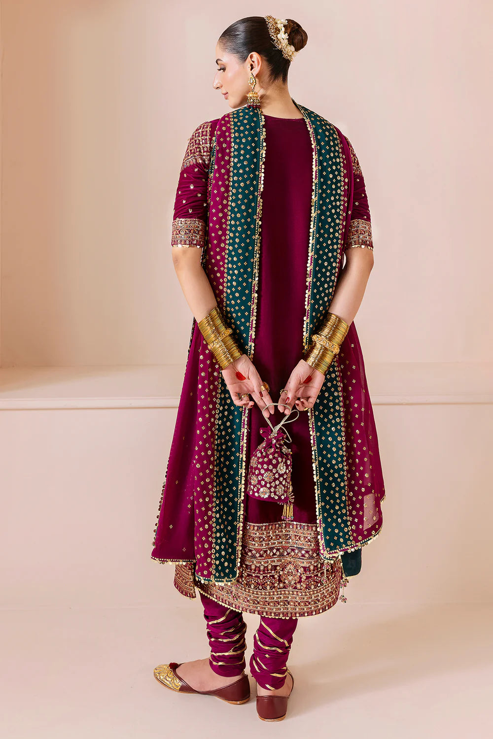 Luxurious CVF D-02 velvet suit with rich embroidery, georgette chiffon dupatta & dyed raw silk bottom. Perfect blend of comfort and elegance for formal events.