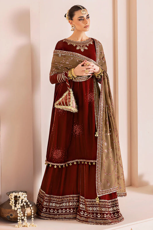 Luxurious pure velvet suit with intricate embroidery on panels, sleeves & borders. Includes embroidered georgette chiffon dupatta for a refined formal look.