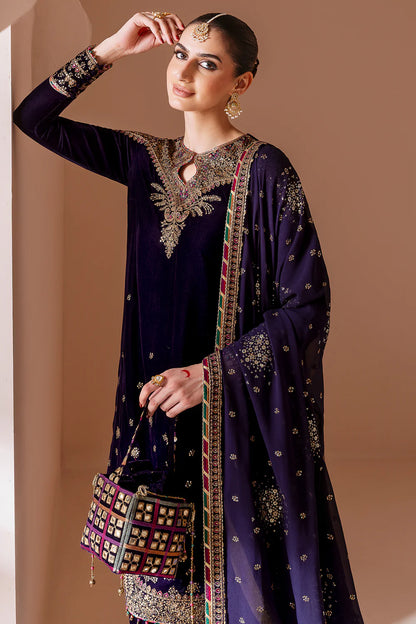 Elegant pure velvet formal dress with rich embroidery and chiffon dupatta. A luxurious outfit crafted for timeless sophistication and formal grace.