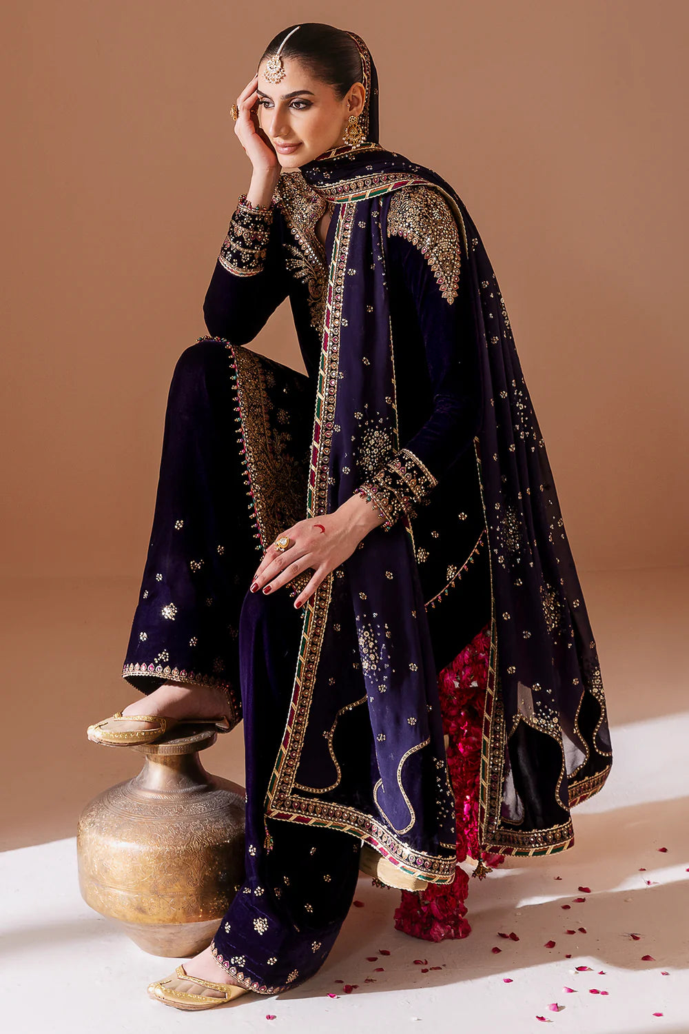 Elegant pure velvet formal dress with rich embroidery and chiffon dupatta. A luxurious outfit crafted for timeless sophistication and formal grace.