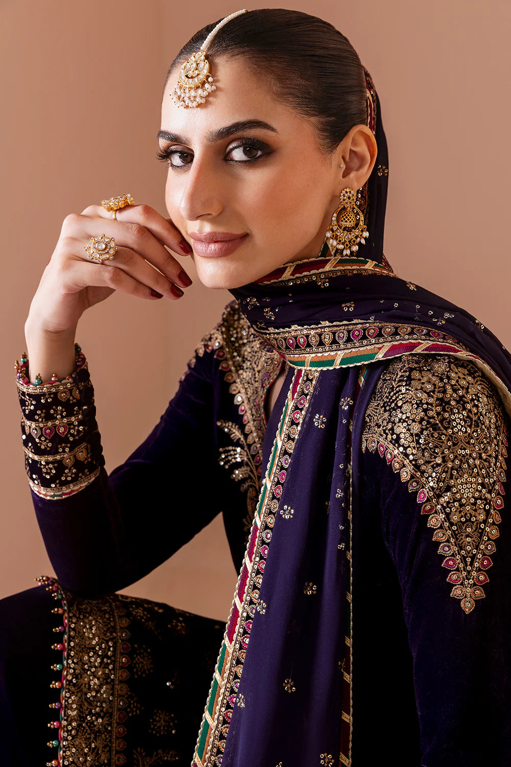 Elegant pure velvet formal dress with rich embroidery and chiffon dupatta. A luxurious outfit crafted for timeless sophistication and formal grace.