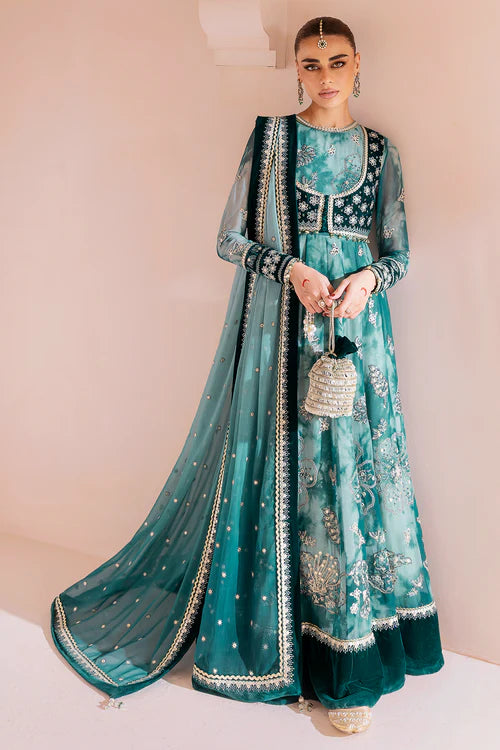 Luxurious velvet and chiffon formal dress with detailed embroidery, digital prints, and raw silk bottom — perfect for graceful, high-end occasions.
