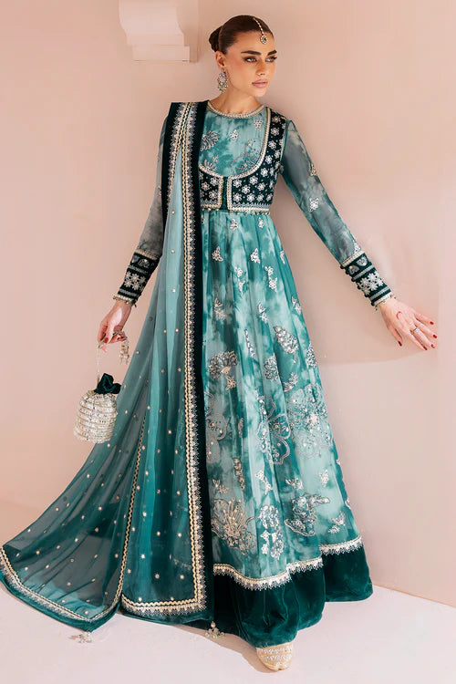 Luxurious velvet and chiffon formal dress with detailed embroidery, digital prints, and raw silk bottom — perfect for graceful, high-end occasions.
