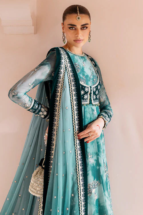 Luxurious velvet and chiffon formal dress with detailed embroidery, digital prints, and raw silk bottom — perfect for graceful, high-end occasions.