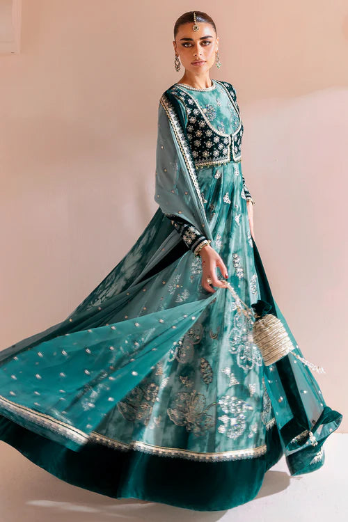 Luxurious velvet and chiffon formal dress with detailed embroidery, digital prints, and raw silk bottom — perfect for graceful, high-end occasions.