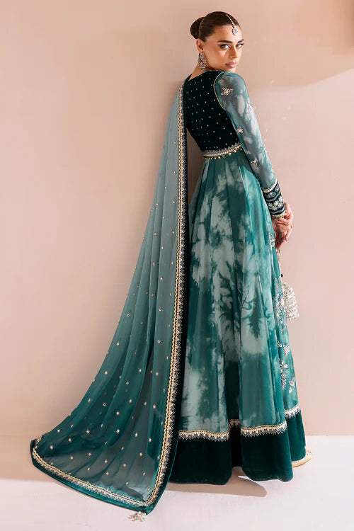 Luxurious velvet and chiffon formal dress with detailed embroidery, digital prints, and raw silk bottom — perfect for graceful, high-end occasions.