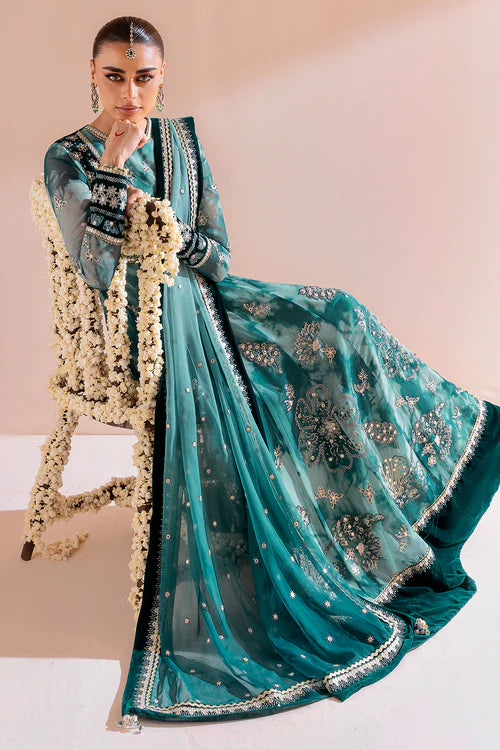 Luxurious velvet and chiffon formal dress with detailed embroidery, digital prints, and raw silk bottom — perfect for graceful, high-end occasions.