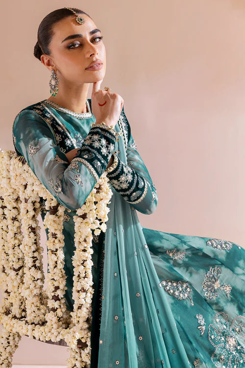 Luxurious velvet and chiffon formal dress with detailed embroidery, digital prints, and raw silk bottom — perfect for graceful, high-end occasions.