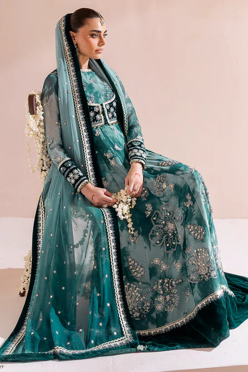 Luxurious velvet and chiffon formal dress with detailed embroidery, digital prints, and raw silk bottom — perfect for graceful, high-end occasions.