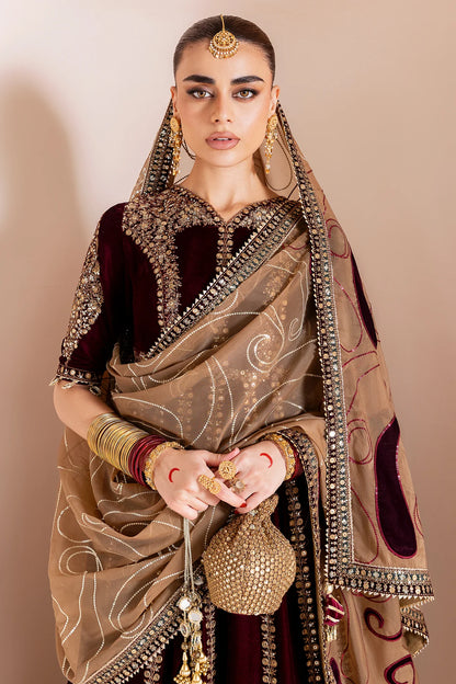 Luxurious velvet formal dress with intricate embroidery, organza dupatta, and silk crushed bottom. A timeless unstitched outfit for elegant evening wear.