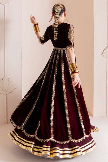 Luxurious velvet formal dress with intricate embroidery, organza dupatta, and silk crushed bottom. A timeless unstitched outfit for elegant evening wear.