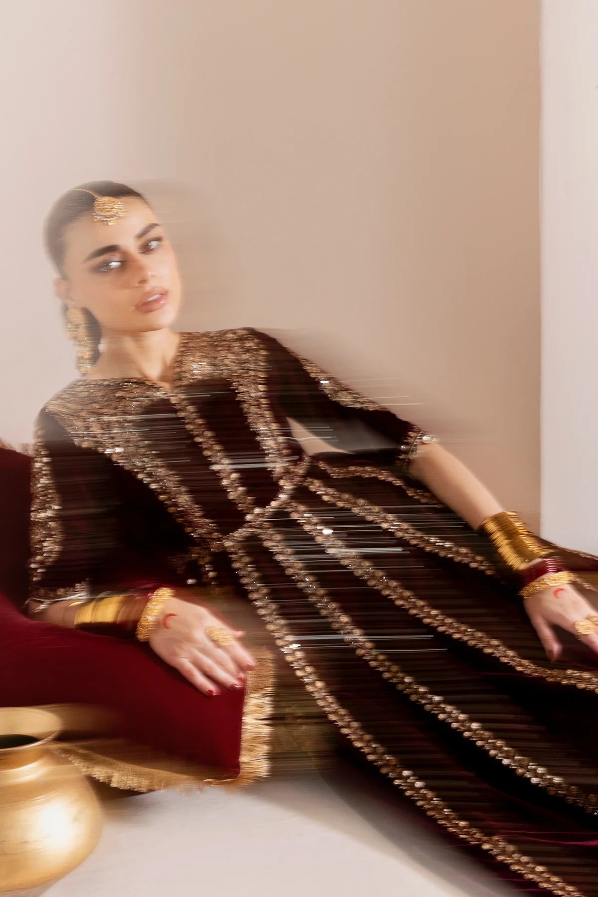 Luxurious velvet formal dress with intricate embroidery, organza dupatta, and silk crushed bottom. A timeless unstitched outfit for elegant evening wear.