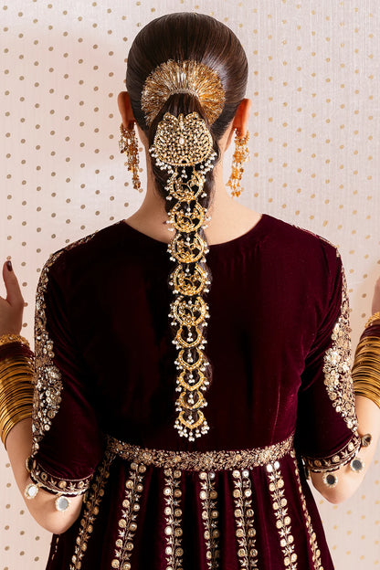 Luxurious velvet formal dress with intricate embroidery, organza dupatta, and silk crushed bottom. A timeless unstitched outfit for elegant evening wear.