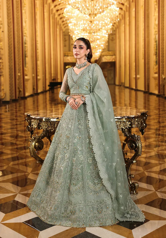 Lime Light by Elaf Stardom ’25 features hand-embroidered organza panels, elegant dupatta, and raw silk inner — perfect for festive gatherings and formal occasions.