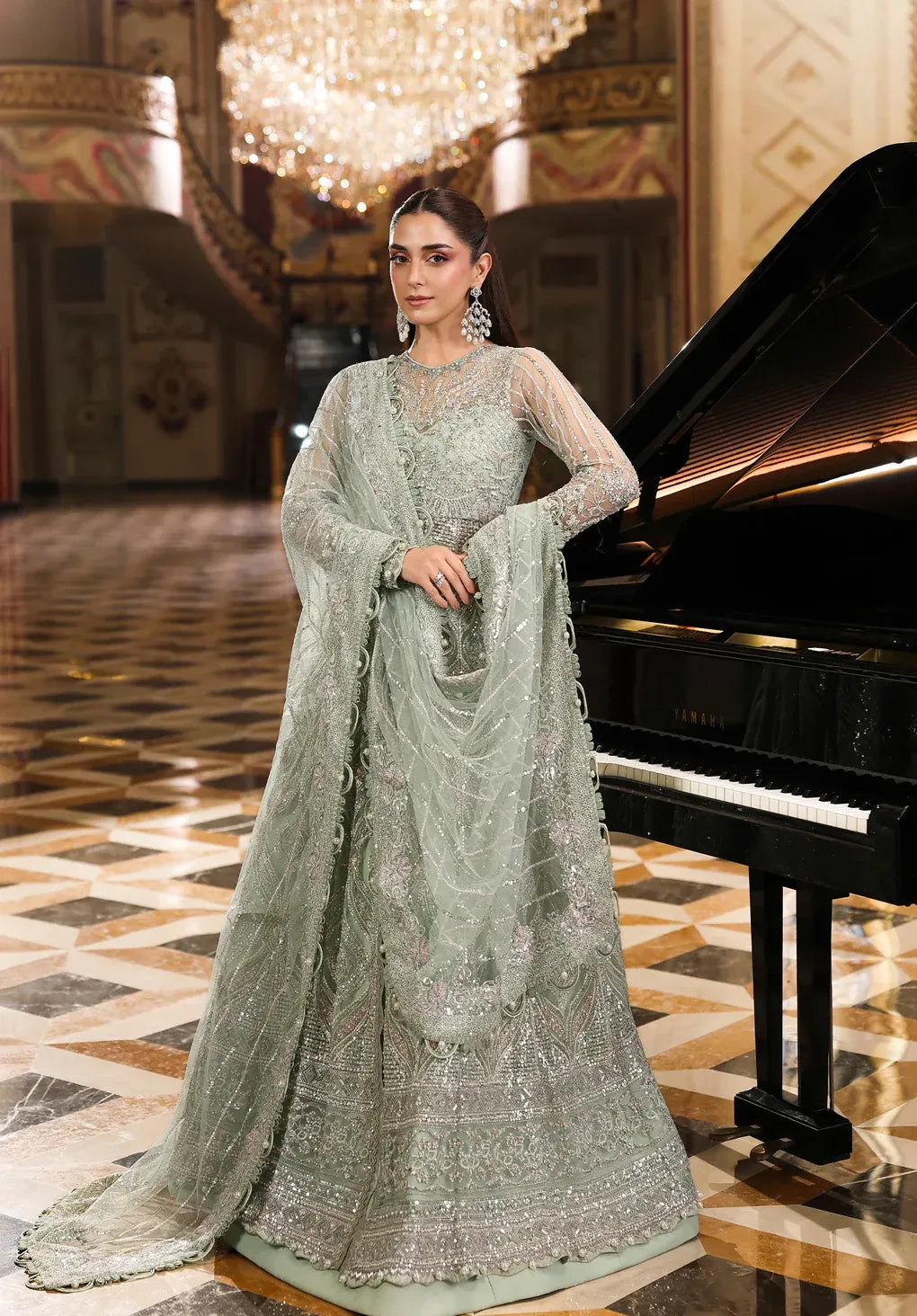 Elaf Stardom Diana – Hand Embellished 3Pc Poly Net SetDiana by Elaf Stardom ’25 features hand-embroidered poly-net panels, elegant dupatta, and raw silk inner — perfect for festive occasions and timeless sophistication.