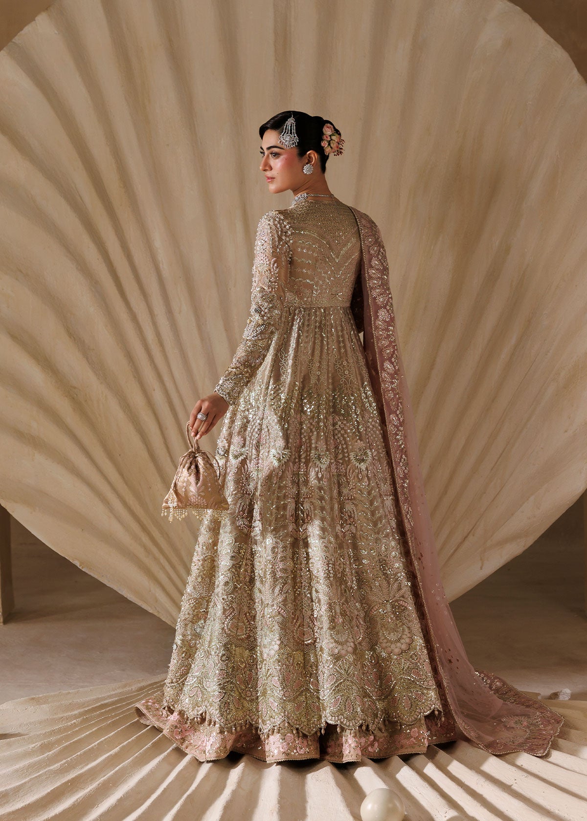 Sardinia Regalia with embroidered net dupatta and raw silk lehenga